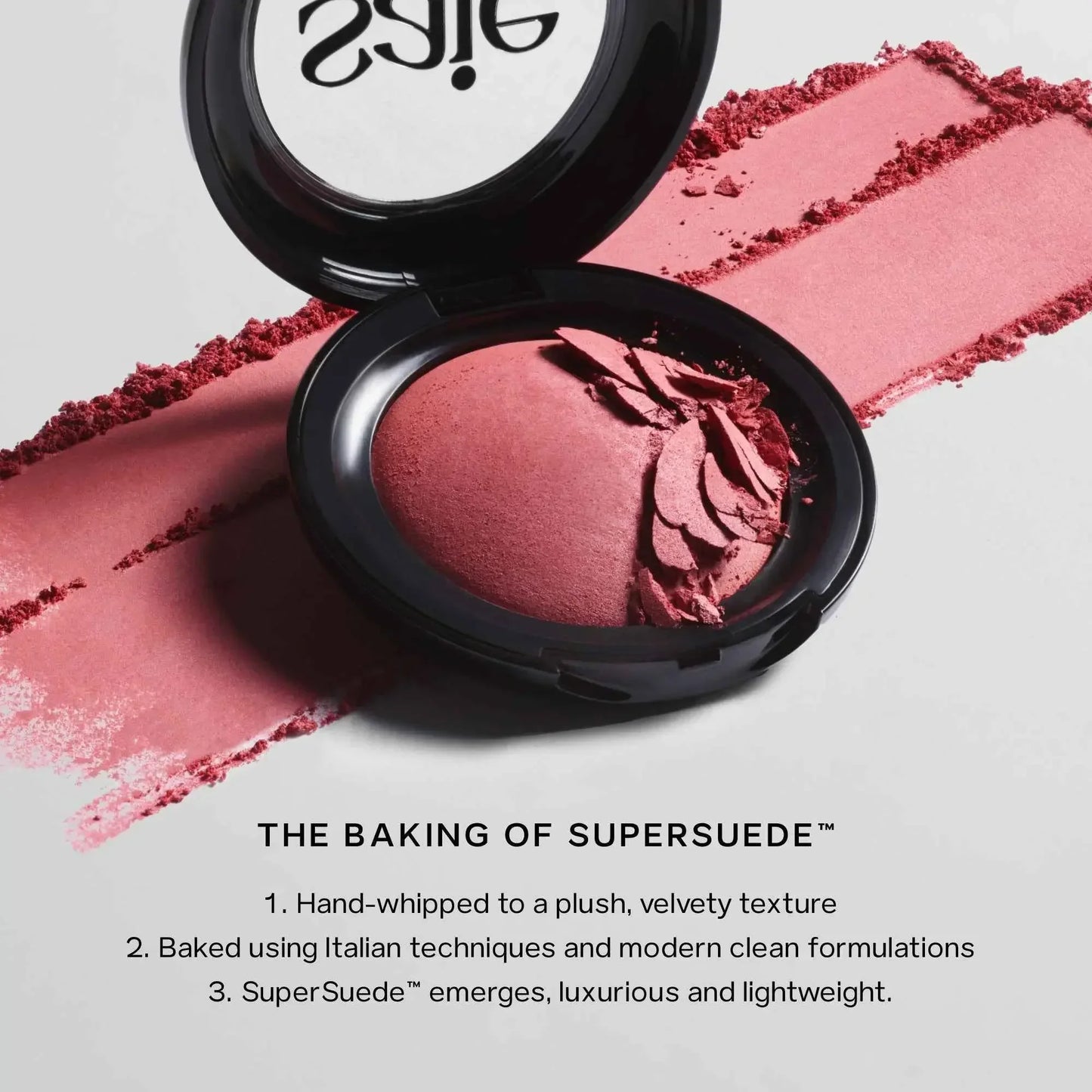 Open compact of pink baked powder blush with velvety, matte texture and soft finish.