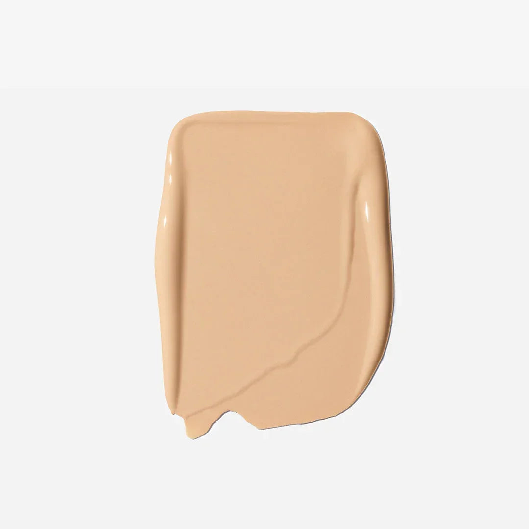 Creamy light beige concealer swatch with dewy finish, Wylde Grey beauty essentials.