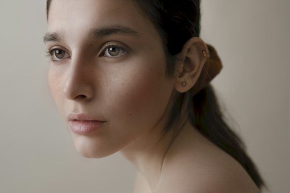 Bare skin portrait in daylight