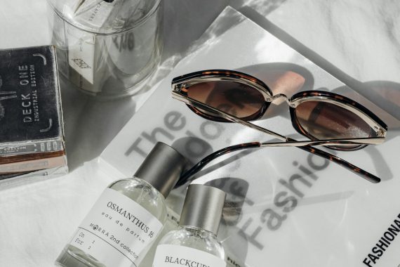 Fragrance flatlay on linen
